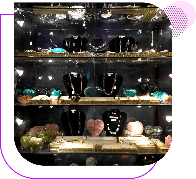 A display case with several different types of jewelry.