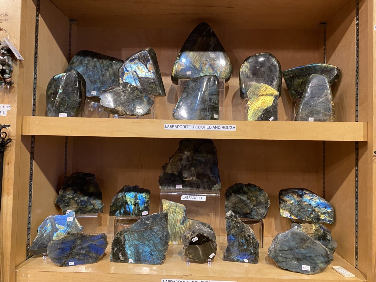 A shelf with many different types of rocks.